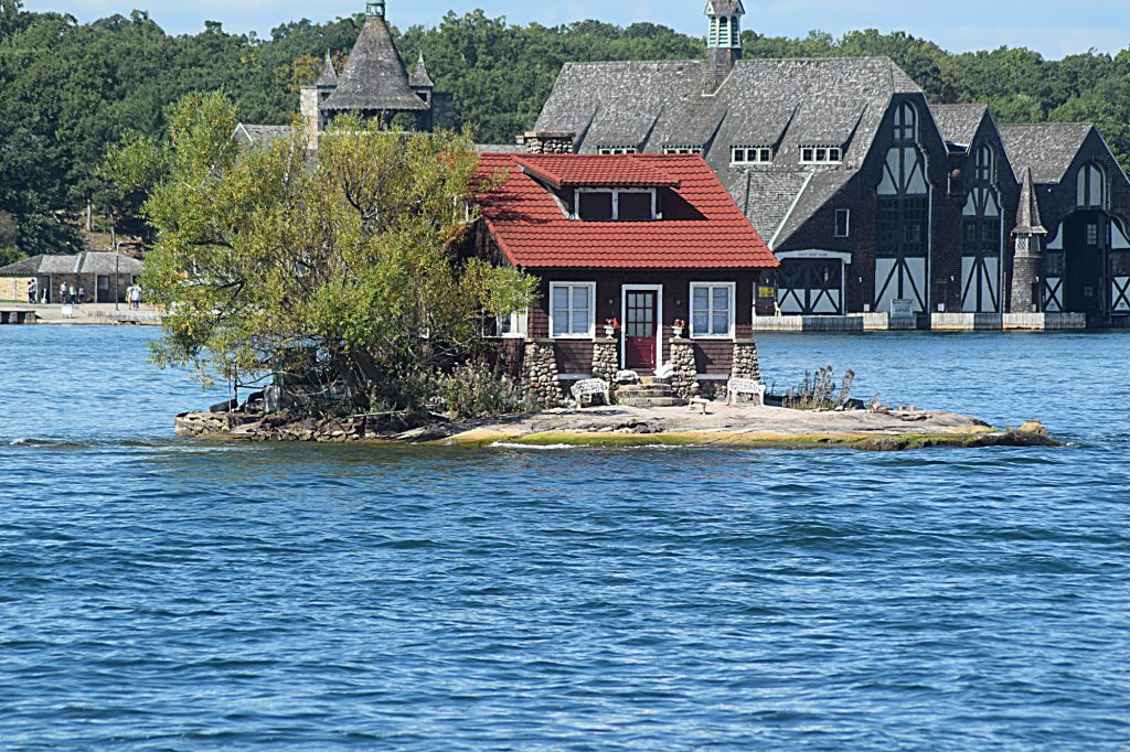 Just Enough Room in front and Bolt's Boat house behind. Please note the telephoto lens makes them look closer together than they are.